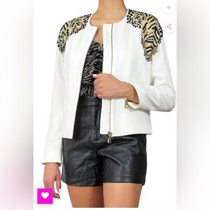 JAZMIN CHEBAR BLAZER TIGRES
New
Size S